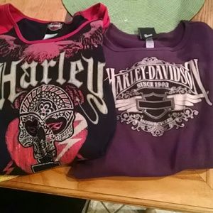 Two long sleeve harley shirts.
